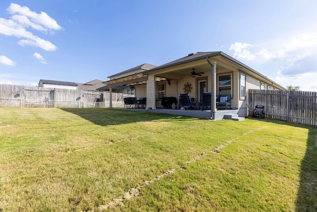 6045 Teodoro Bnd, Round Rock, TX 78665 - rear view of house with ceiling fan, a fenced backyard, and a patio