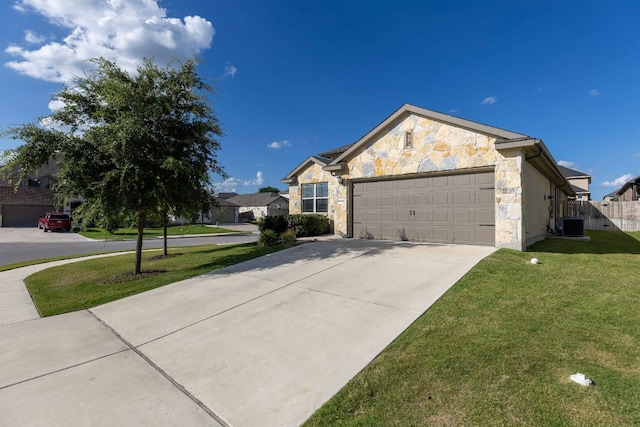 6045 Teodoro Bnd, Round Rock, TX 78665 - view of front of property with stone siding, a garage, and concrete driveway