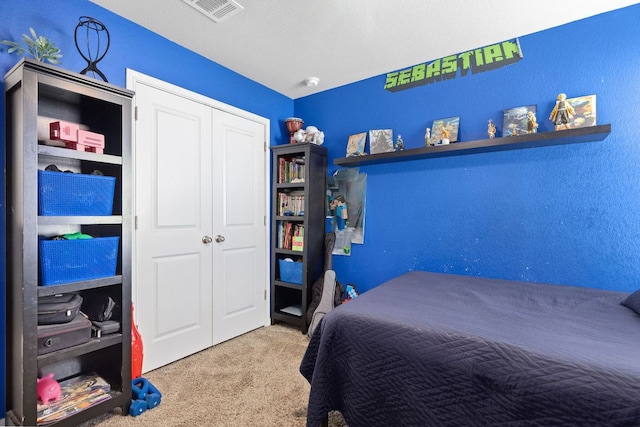 6045 Teodoro Bnd, Round Rock, TX 78665 - bedroom featuring carpet floors and a closet