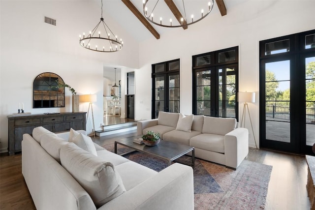205 Hi Ridge Rd, Horseshoe Bay, TX 78657 - living room featuring a chandelier, french doors, beam ceiling, high vaulted ceiling, and wood finished floors