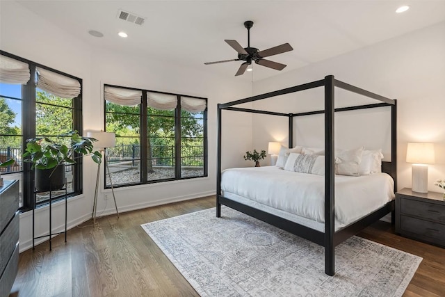 205 Hi Ridge Rd, Horseshoe Bay, TX 78657 - bedroom featuring wood finished floors, a ceiling fan, and recessed lighting