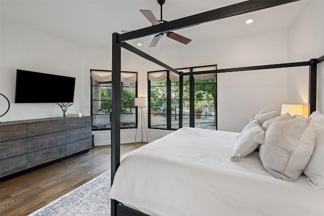 205 Hi Ridge Rd, Horseshoe Bay, TX 78657 - bedroom with recessed lighting, wood finished floors, and a ceiling fan