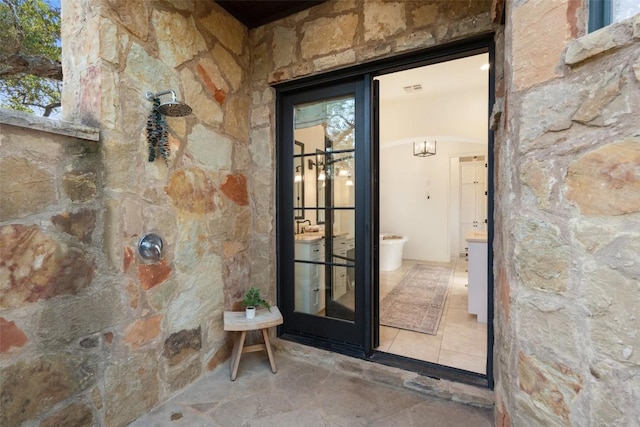 205 Hi Ridge Rd, Horseshoe Bay, TX 78657 - entrance to property featuring stone siding