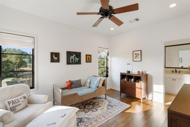 205 Hi Ridge Rd, Horseshoe Bay, TX 78657 - living area featuring wood finished floors, a ceiling fan, and recessed lighting