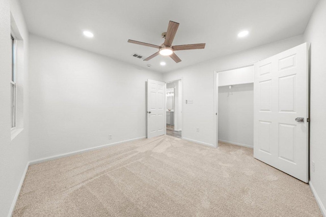 7309 Blessing Ave, Austin, TX 78752 - unfurnished bedroom featuring recessed lighting, light carpet, ceiling fan, and a closet