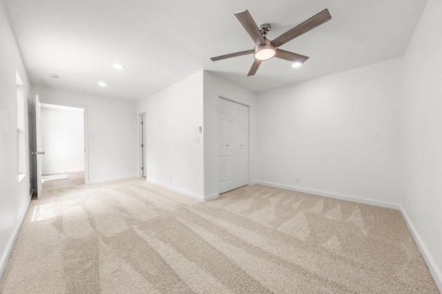 7309 Blessing Ave, Austin, TX 78752 - unfurnished room with light colored carpet, a ceiling fan, and recessed lighting