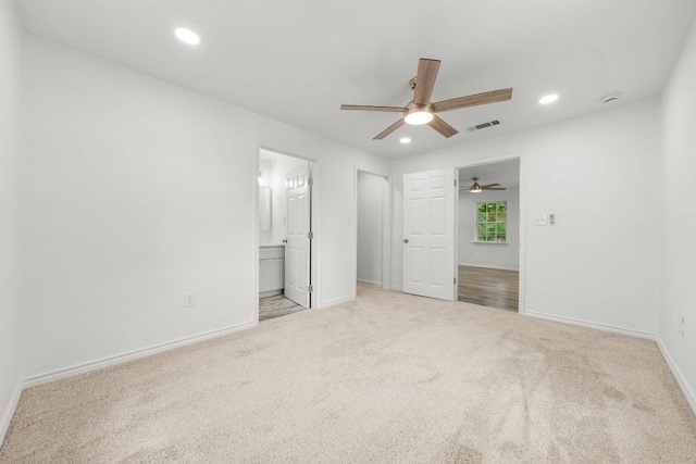 7309 Blessing Ave, Austin, TX 78752 - unfurnished bedroom with carpet floors, recessed lighting, ensuite bathroom, and a ceiling fan