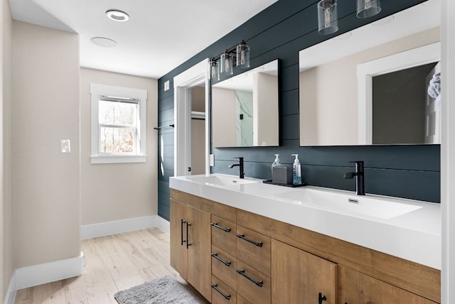 TBD Fm 3000, Elgin, TX 78621 - bathroom with double vanity and wood finished floors
