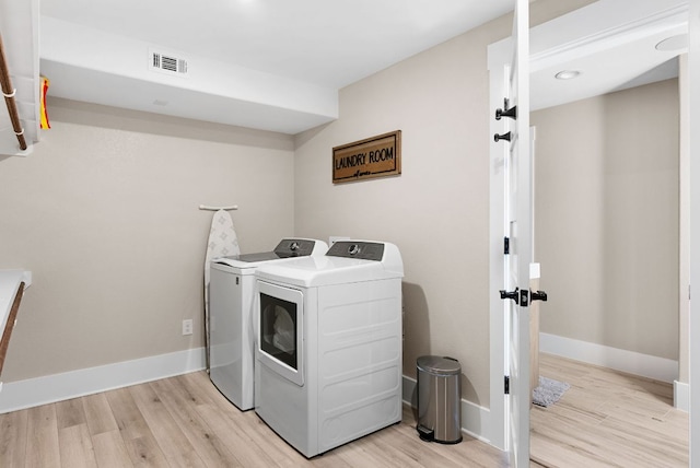 TBD Fm 3000, Elgin, TX 78621 - laundry area with washing machine and dryer, light wood finished floors, and recessed lighting