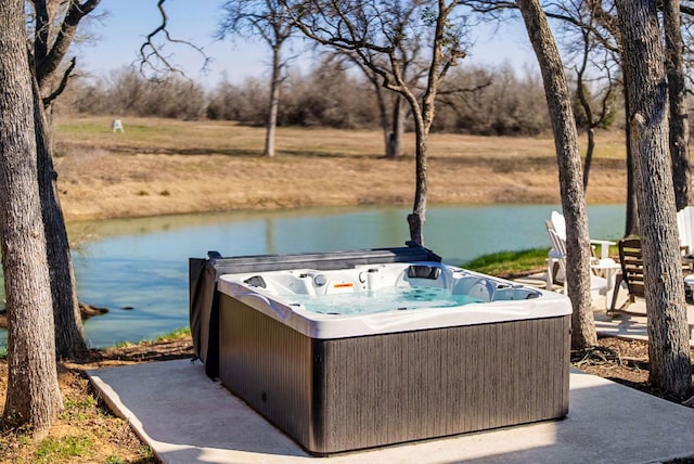 TBD Fm 3000, Elgin, TX 78621 - dock area featuring a water view and a hot tub