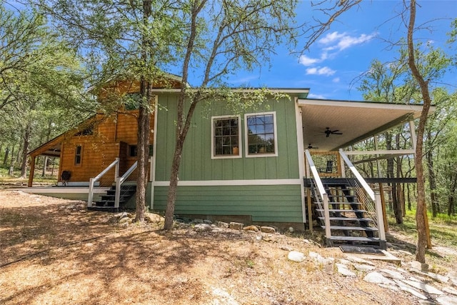 415 Balch Rd, Elgin, TX 78621 - view of side of home with ceiling fan and stairway