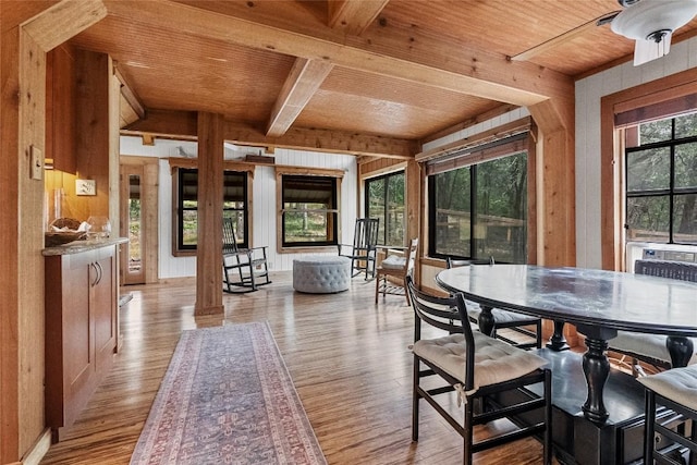 415 Balch Rd, Elgin, TX 78621 - dining room with wood finished floors, wood walls, a wooden ceiling with exposed beams, and ceiling fan