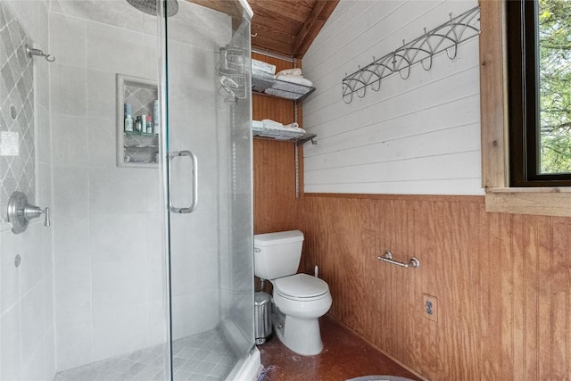 415 Balch Rd, Elgin, TX 78621 - bathroom featuring wood walls, a shower stall, wooden ceiling, and a wainscoted wall