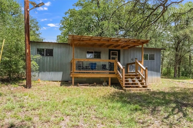 415 Balch Rd, Elgin, TX 78621 - rear view of property with a wooden deck