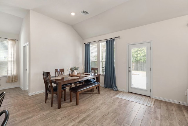 232 Silver Pass, Kyle, TX 78640 - dining room with light wood finished floors and vaulted ceiling