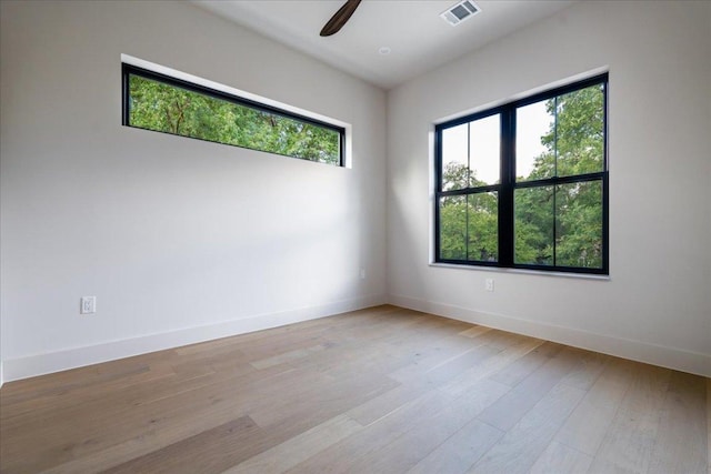 3003 W French Pl Unit 1, Austin, TX 78722 - spare room featuring ceiling fan and light wood-type flooring