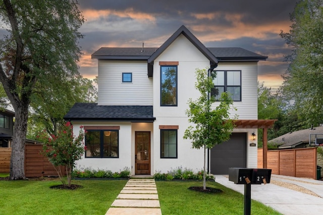 3003 W French Pl Unit 1, Austin, TX 78722 - contemporary house featuring an attached garage, concrete driveway, a shingled roof, and stucco siding