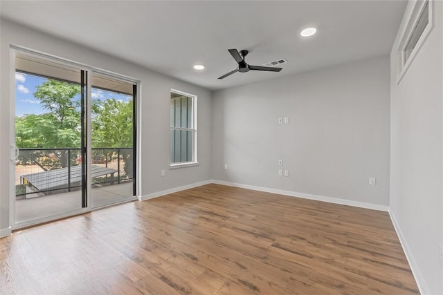 4510 Terry-O Ln Unit 205, Austin, TX 78745 - unfurnished room featuring ceiling fan, wood finished floors, and recessed lighting