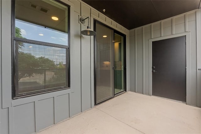 4510 Terry-O Ln Unit 205, Austin, TX 78745 - entrance to property with board and batten siding and a patio area