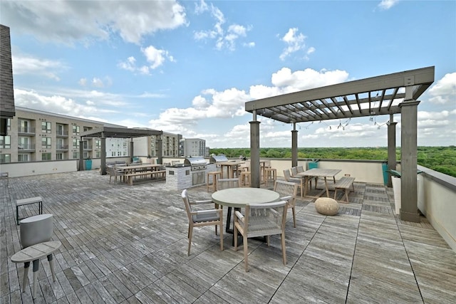 4501 Jackson Ave Unit 5301, Austin, TX 78731 - view of patio with an outdoor kitchen, a pergola, and outdoor dining area
