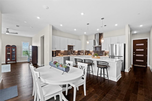 4501 Jackson Ave Unit 5301, Austin, TX 78731 - dining room with dark wood-style floors, recessed lighting, and a ceiling fan