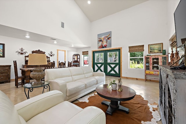 705 Peregrine Way, Leander, TX 78641 - living room with high vaulted ceiling and recessed lighting