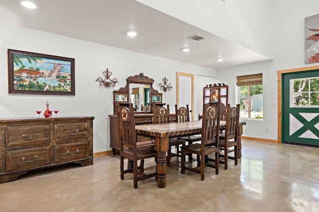 705 Peregrine Way, Leander, TX 78641 - dining space featuring concrete flooring and recessed lighting