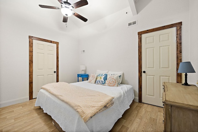 705 Peregrine Way, Leander, TX 78641 - bedroom with vaulted ceiling, light wood-type flooring, and a ceiling fan