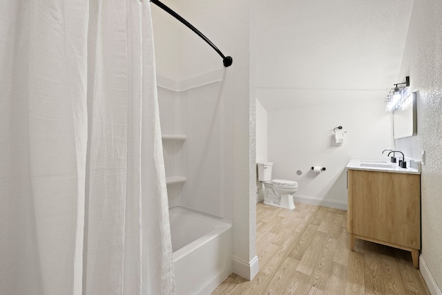 705 Peregrine Way, Leander, TX 78641 - bathroom with wood finished floors, vanity, and shower / bathtub combination with curtain