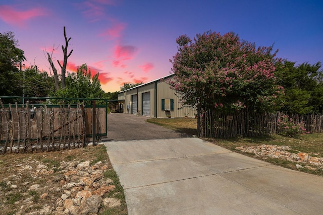 705 Peregrine Way, Leander, TX 78641 - view of front facade featuring a detached garage and an outbuilding