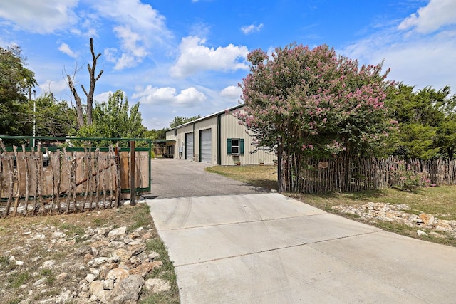 705 Peregrine Way, Leander, TX 78641 - view of front of home featuring a garage and an outdoor structure