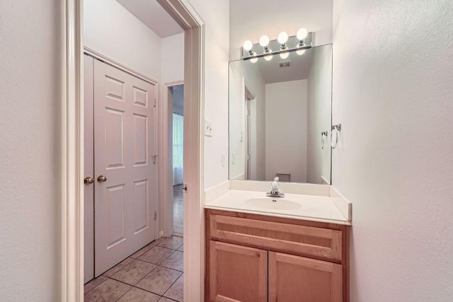 2920 Thrushwood Dr, Austin, TX 78757 - bathroom with vanity and tile patterned flooring