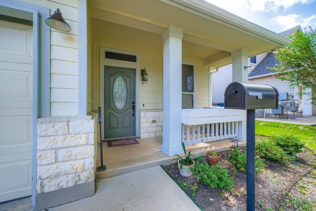 2920 Thrushwood Dr, Austin, TX 78757 - view of exterior entry with covered porch and stone siding