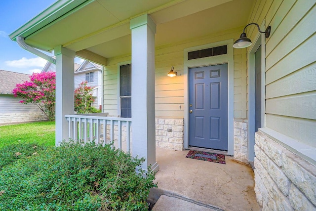 2920 Thrushwood Dr, Austin, TX 78757 - entrance to property with a porch and stone siding