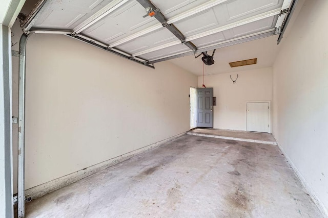2920 Thrushwood Dr, Austin, TX 78757 - garage featuring a garage door opener