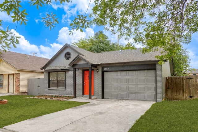 3050 Beacon Fld, San Antonio, TX 78245 - view of front of house featuring brick siding, driveway, an attached garage, and roof with shingles