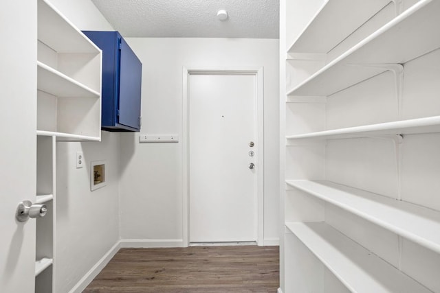 3050 Beacon Fld, San Antonio, TX 78245 - washroom featuring wood finished floors, washer hookup, and a textured ceiling