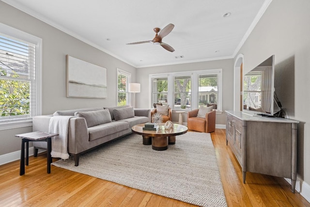 4206 Sinclair Ave, Austin, TX 78756 - living room with light wood-type flooring, ornamental molding, and ceiling fan