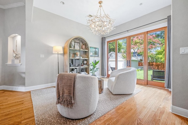4206 Sinclair Ave, Austin, TX 78756 - living area with wood finished floors and a chandelier