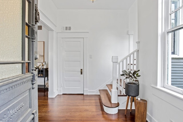 607 W 32nd St, Austin, TX 78705 - entryway featuring dark wood-style floors and stairway