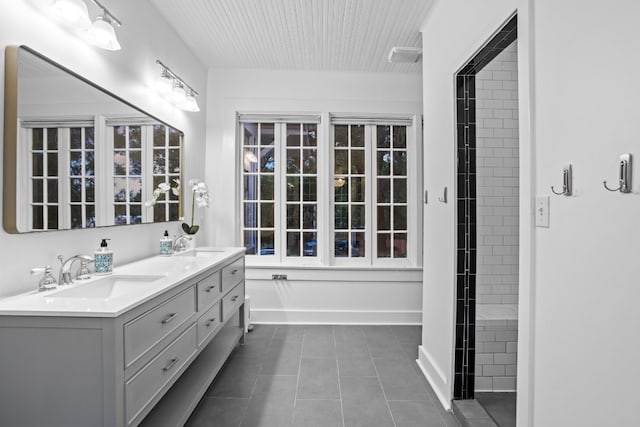 607 W 32nd St, Austin, TX 78705 - full bath featuring double vanity and tile patterned floors