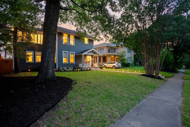 607 W 32nd St, Austin, TX 78705 - view of front of property featuring covered porch and a front lawn