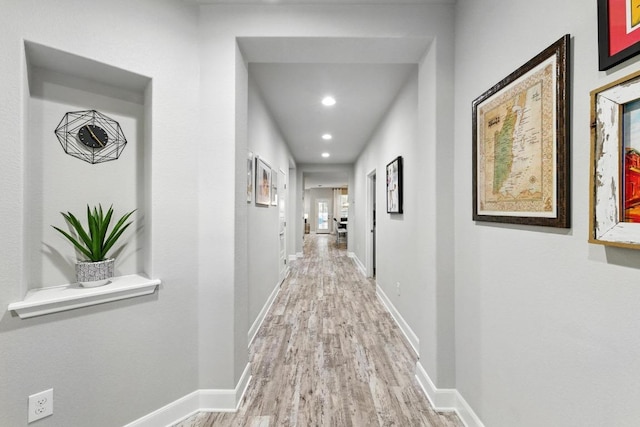 9108 Alex Ln, Austin, TX 78748 - hall with light wood-style flooring and recessed lighting