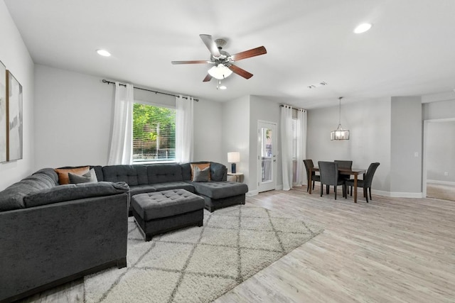 9108 Alex Ln, Austin, TX 78748 - living area featuring wood finished floors, recessed lighting, and ceiling fan