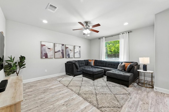 9108 Alex Ln, Austin, TX 78748 - living area featuring wood finished floors, a ceiling fan, and recessed lighting