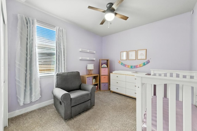 9108 Alex Ln, Austin, TX 78748 - bedroom with light colored carpet, a nursery area, and a ceiling fan