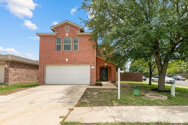 6828 Walkup Ln, Austin, TX 78747 - traditional-style home with an attached garage, brick siding, and concrete driveway