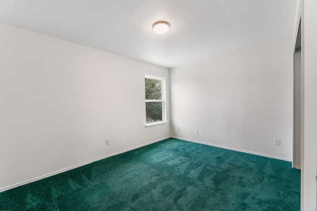 6828 Walkup Ln, Austin, TX 78747 - empty room with dark carpet