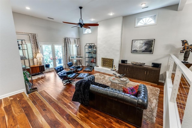 5731 Sam Houston Cir, Austin, TX 78731 - living area with a ceiling fan, french doors, wood finished floors, healthy amount of natural light, and recessed lighting