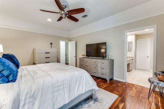 5731 Sam Houston Cir, Austin, TX 78731 - bedroom with wood finished floors, recessed lighting, ceiling fan, and connected bathroom